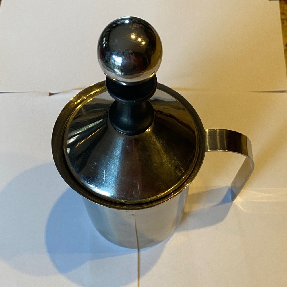 Elegant Silver Milk Frother with Black Handle